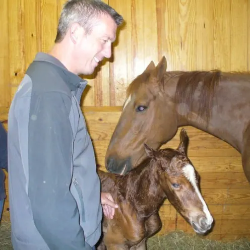 Dr. Browning evaluating mare and newborn filly